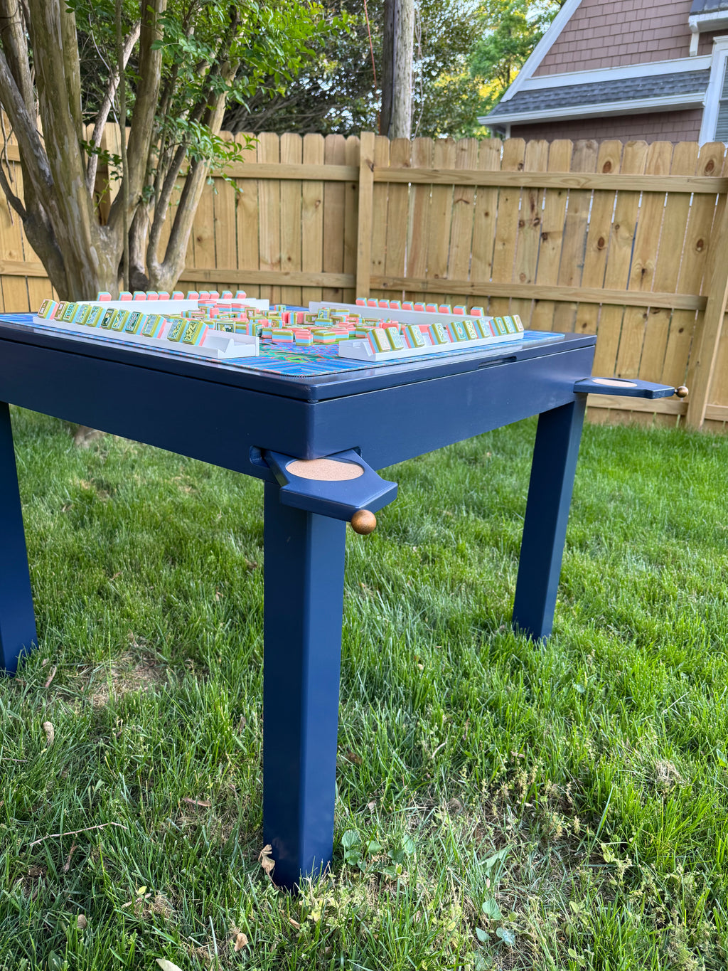 Muse Game Table open storage lid showing hidden compartment for mahjong tiles and game accessories