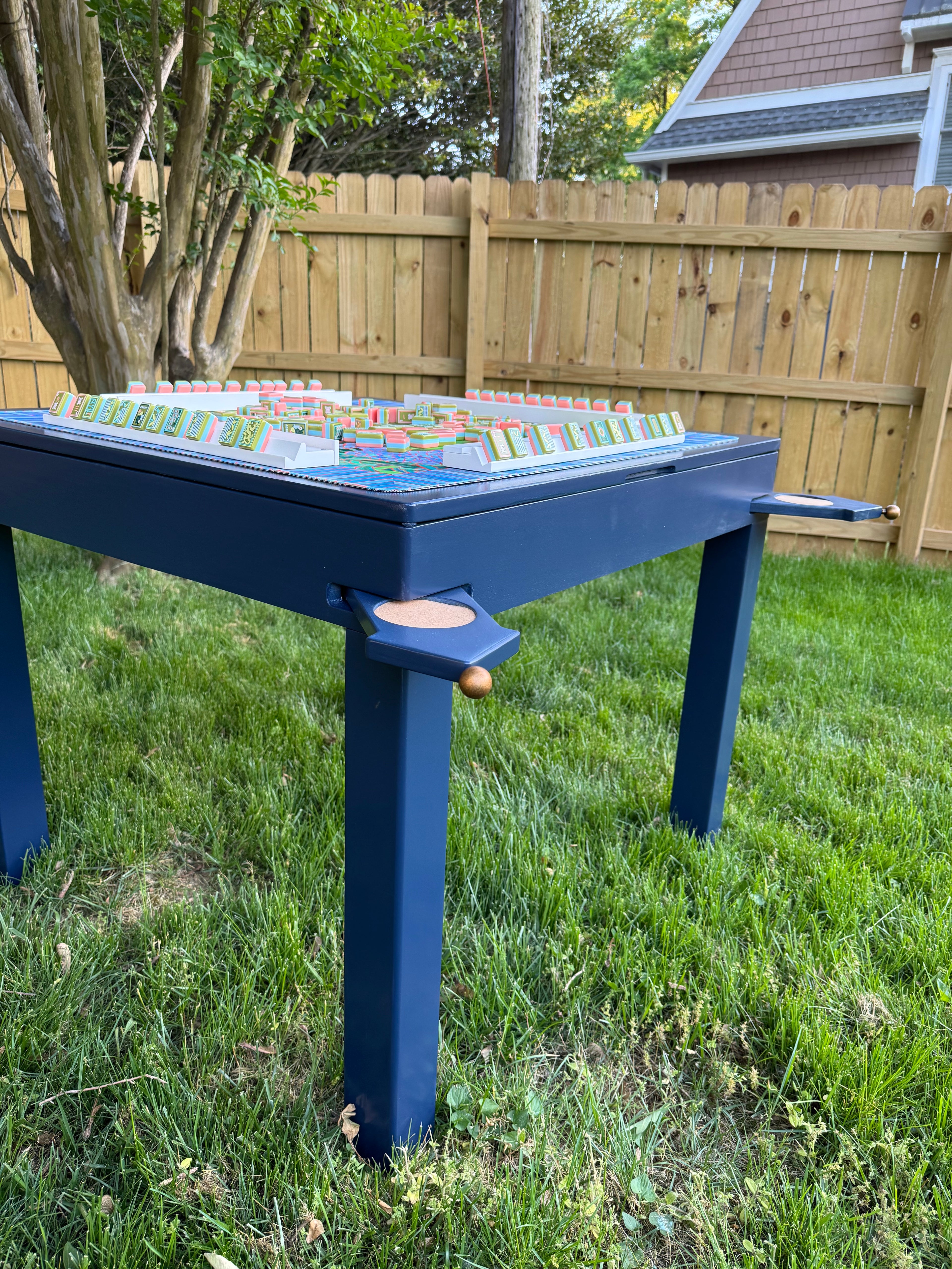 Muse Game Table open storage lid showing hidden compartment for mahjong tiles and game accessories